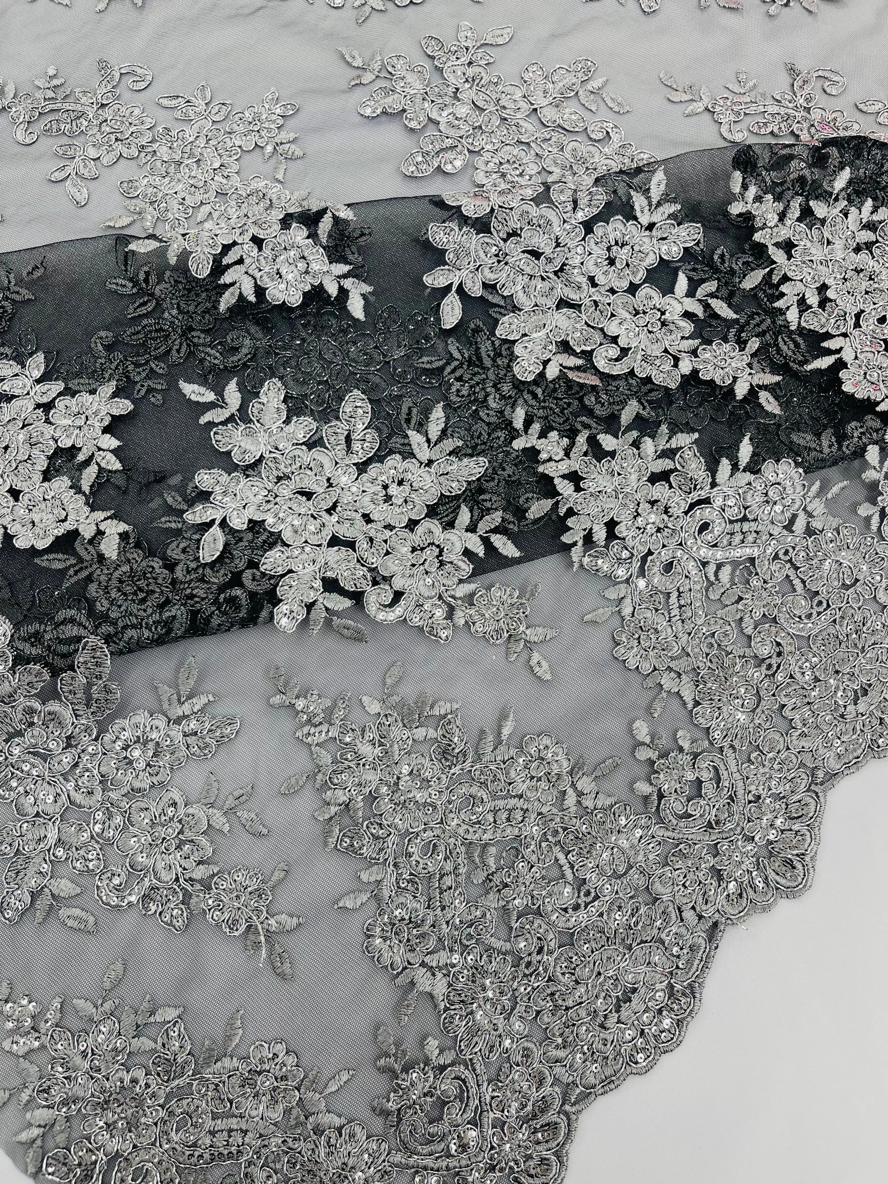 Silver Metallic corded embroider with sequins on a Black mesh lace fabric-prom-sold by the yard.